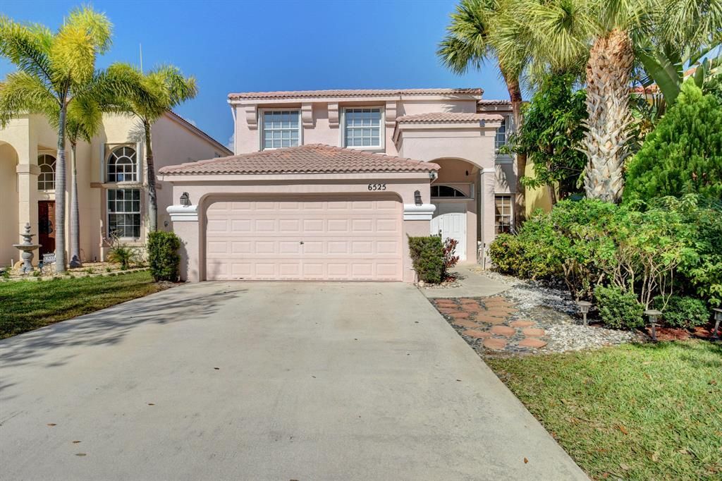 Photo of 6525 Columbia Avenue Ave, Lake Worth Beach, FL 33467 (MLS # R10765149)