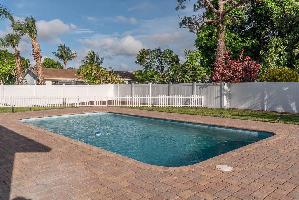 Photo of 2712 Lake Ida Road, Delray Beach, FL 33445 (MLS # B26039013)