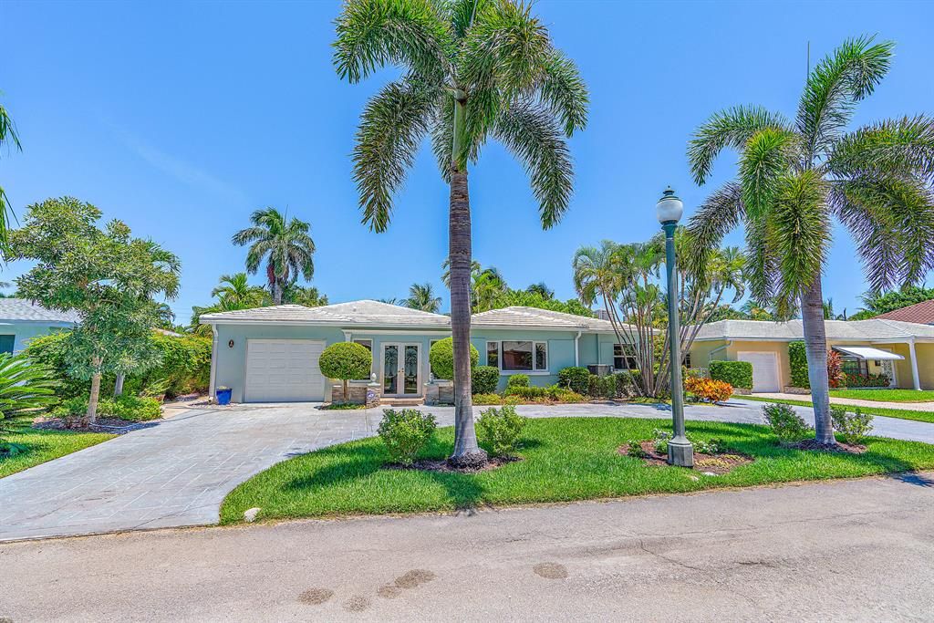 Photo of 331 Cascade Lane, Palm Beach Shores, FL 33404 (MLS # R10698458)