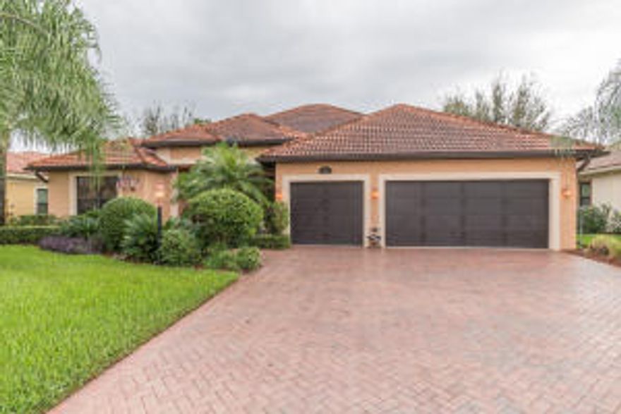 Beautiful, spacious, and private 4 bedroom (possible 5 or 6), 3.5 bath, 3 car garage home with two family rooms, plus living room, dining room, and office. Fabulous back yard with large pool, rock waterfall, and fire pit all backing to the preserve. The kitchen has plenty of cabinets, breakfast bar, separate eating area and prep island plus a walk in pantry and stainless steel appliances. The spacious master suite has French doors opening to the pool. Upstairs is a great second family room with a deck overlooking the pool and private preserve. Plenty of space for everyone. Beautiful gated community. Great schools and minutes to beaches.