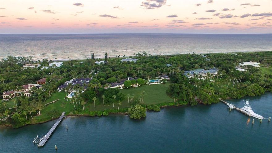 Rarely does a property become available in all of south Florida that can compare to 430 S Beach on Jupiter Island. Designed by pre-eminent architect, Marion Sims Wyeth, the 4 bedroom main house and 3 bedroom guest house on 4.4+ acres sit on one of the Island's highest elevations and are surrounded by expansive terraces and a glistening pool. 366' of Intracoastal frontage provide glorious, unobstructed views across the water to a ''forever natural'' sanctuary. Deep water will accommodate a large yacht and unfettered access to the ocean minutes away. Included in the property is a 10' beachfront parcel which grants the owner deeded right to ocean access. Lush landscaping and old growth trees create complete privacy and seclusion. Jupiter Island building regulations will permit additions or new construction up to 18,000 sf. ft. 
The convenient south end location ensures a quick connection to mainland shops and restaurants, Palm Beach and airports.