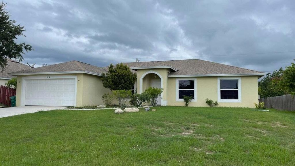 Photo of 519 SW Laconic Avenue, Port St Lucie, FL 34986 (MLS # R10900347)