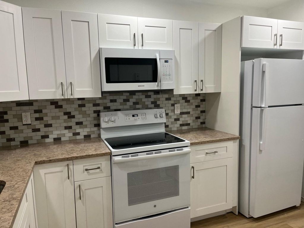 Photo of 11241 W Atlantic Boulevard #201, Coral Springs, FL 33071 (MLS # R11164016)