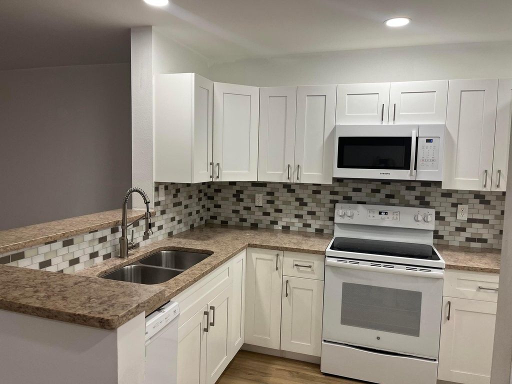 Photo of 11241 W Atlantic Boulevard #201, Coral Springs, FL 33071 (MLS # R11164016)