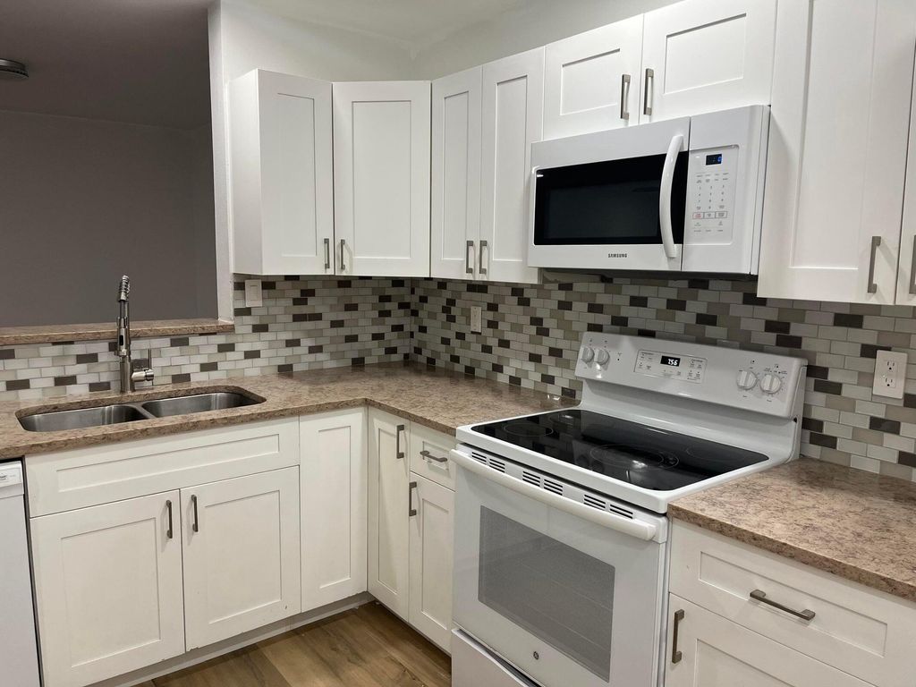 Photo of 11241 W Atlantic Boulevard #201, Coral Springs, FL 33071 (MLS # R11164016)