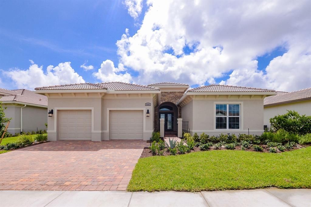 Photo of 8595 SW Amare Way, Port Saint Lucie, FL 34987 (MLS # R10825884)