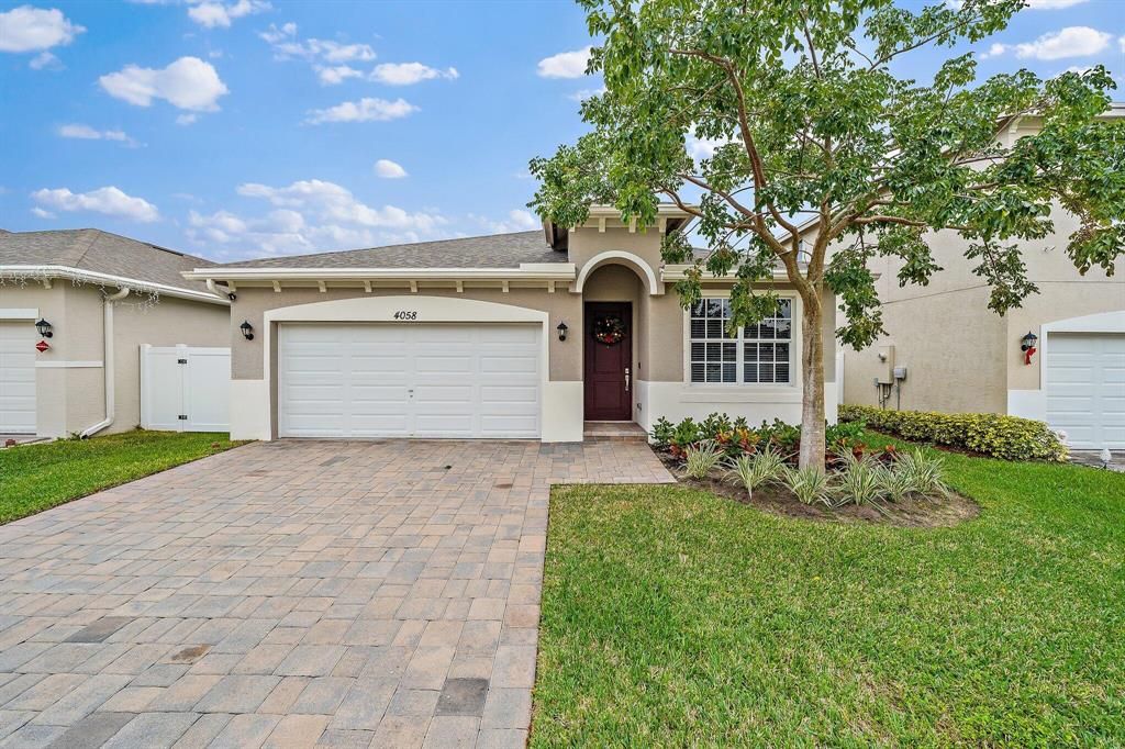 Photo of 4058 Tomoka Drive Dr, Lake Worth Beach, FL 33462 (MLS # R10766512)