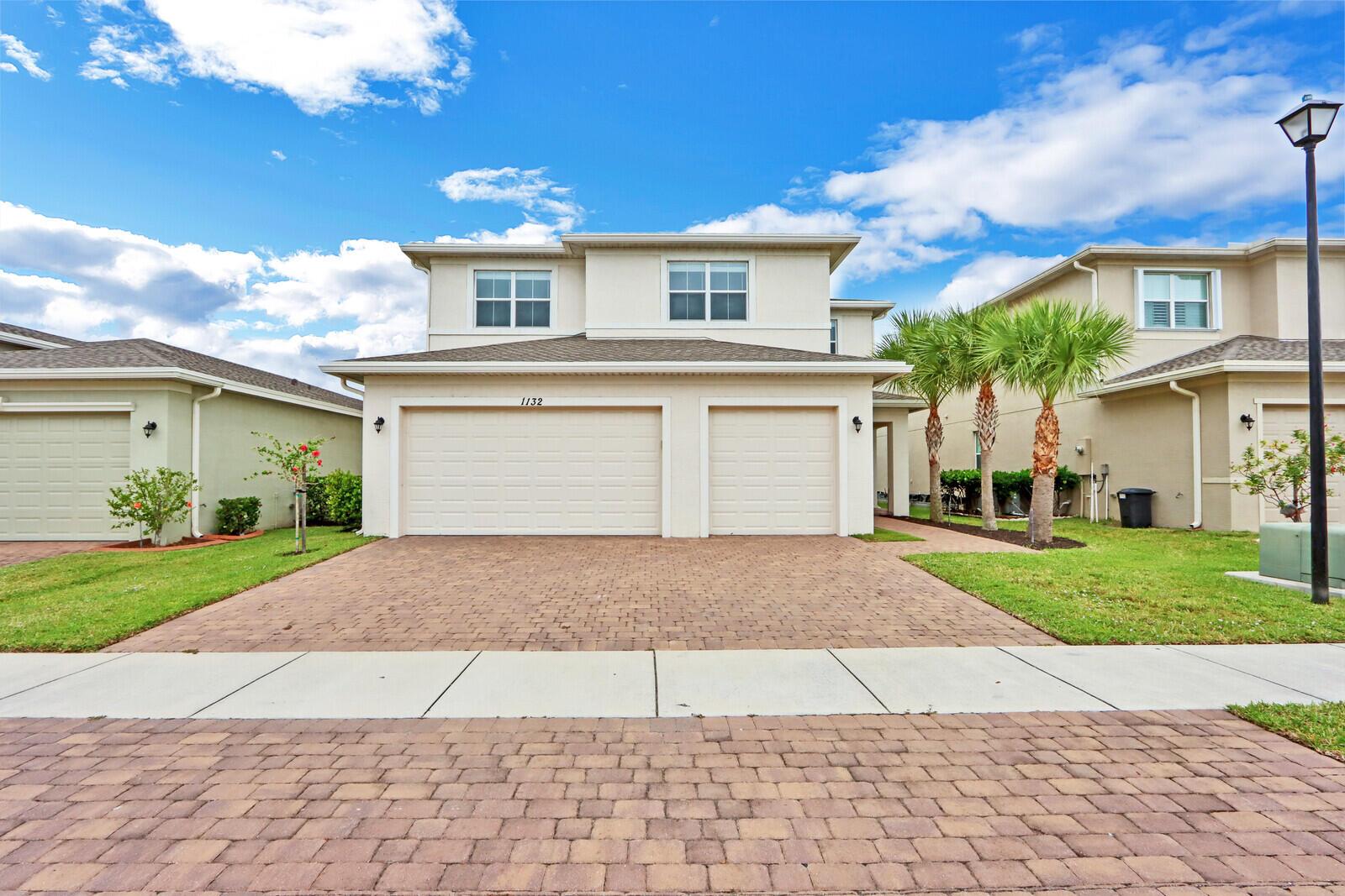 MODEL HOME PERFECT, 6 BEDROOM, 4 BATH, 3 CAR GARAGE ON THE LAKE! This Beautiful home has all the current decorator's finishes, fixtures & colors. Shows like a brand new home with wood & tile floors throughout, quality window coverings & light fixtures throughout, custom ceiling beam work throughout the main level, custom family room entertainment wall system with newer 68'' flat screen tv, quality sound system & a sleek multi-colored heat generating glass fireplace! The kitchen has white cabinets, SS appliances, quartz counters & a large pantry. The main floor bedroom could make a great office! 5 brs up + a loft with a wall mounted TV, perfect as a second family room or study area. Rent includes lawncare, pest control & monthly cleaning service! Gated community with clubhouse & pool!