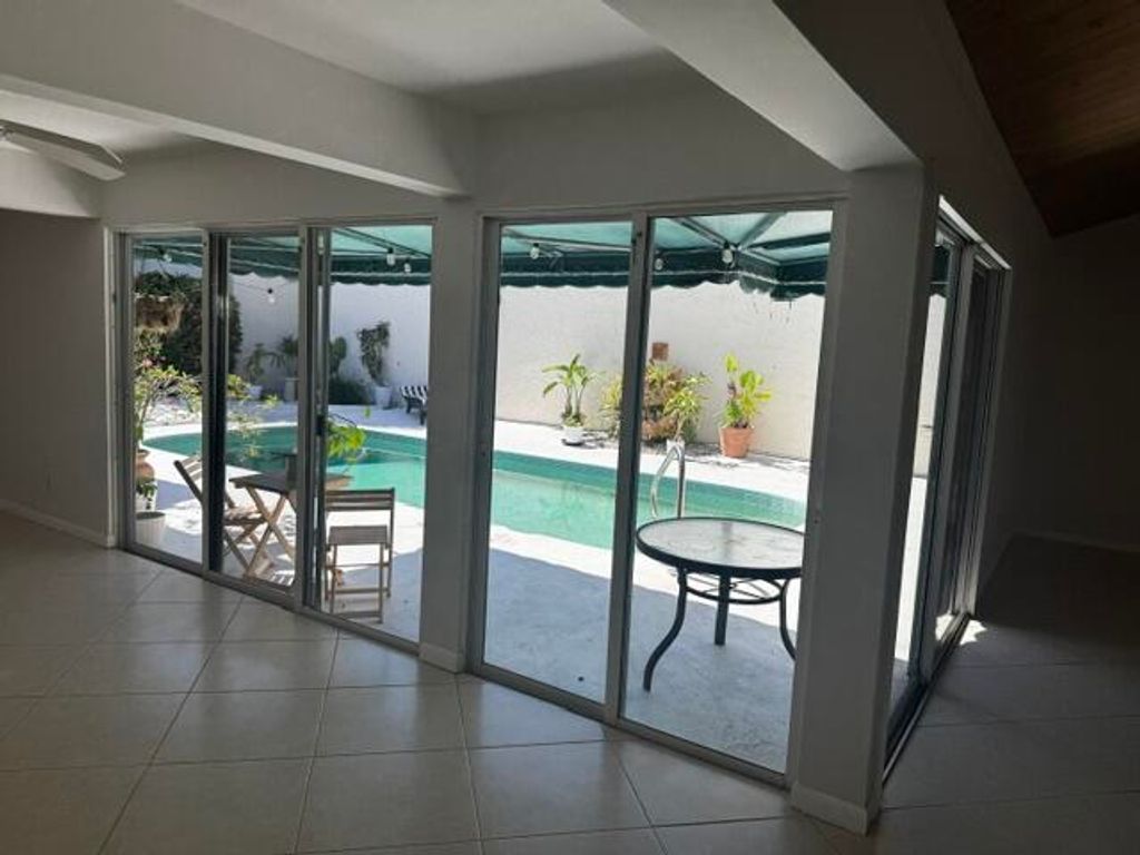 Photo of 112 E Coral Fish Lane, Jupiter, FL 33477 (MLS # B26032102)