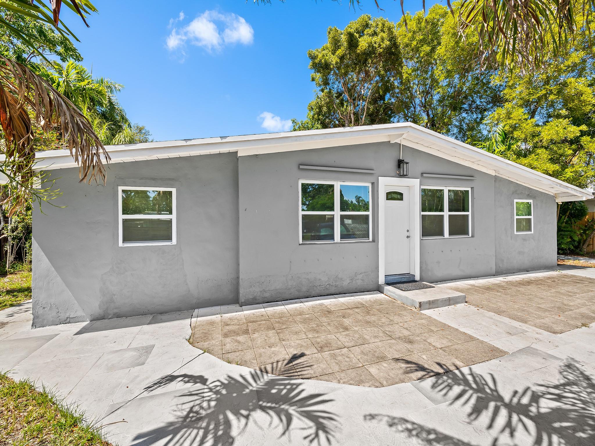 Searching for the perfect home w/NO HOA & mins to I-95? Welcome to your beautifully renovated, 4-bed, 2-bath contemporary styled home located in one of Ft Lauderdale’s most established neighborhoods. Too many features to list! The renovated kitchen is a culinary enthusiast's dream, featuring white cabinets, quartz countertops & stainless-steel appliances. A supersized primary bedroom w/renovated bath offers a private retreat. Gated entry and expanded driveway provide ample parking. Outside, enjoy mature trees and a large fenced in yard for kids & pets. Bonus side porch and screened back porch. Perfectly sized lot to add a pool. A spacious 10x20 ft shed provides for extra storage! Ideally located near shopping centers, downtown Fort Lauderdale & beaches. Don’t miss this! SQFT From BCPA.
