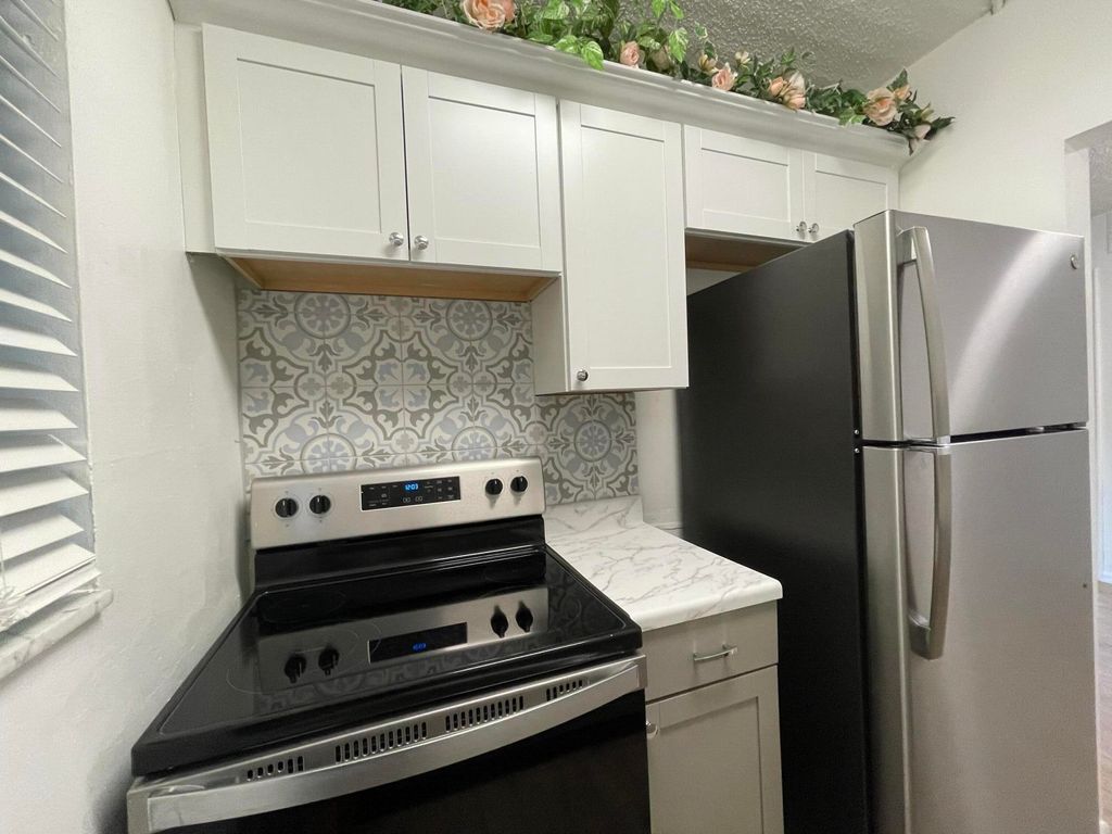 Photo of 306 E Ocean Avenue #103, Boynton Beach, FL 33435 (MLS # R11009063)