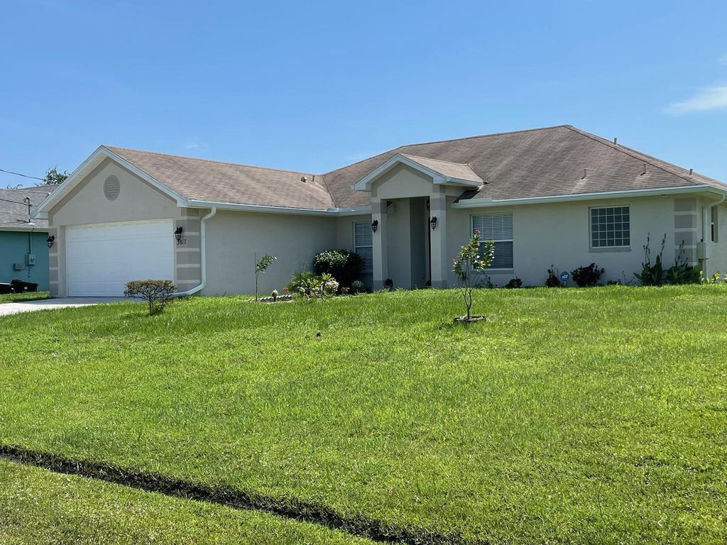 Photo of 3817 SW Wycoff Street, Port St Lucie, FL 34953 (MLS # R10899272)