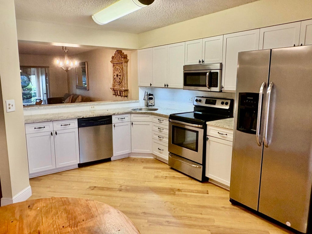 Photo of 7237 S DEVON Drive #110, Tamarac, FL 33321 (MLS # B26060038)