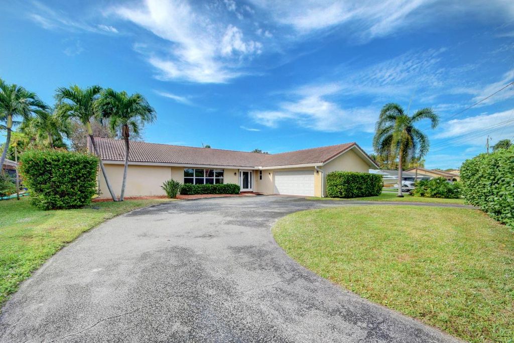 Photo of 1753 W Terrace Drive, Lake Worth Beach, FL 33460 (MLS # R11144922)