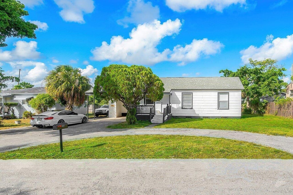 Photo of 921 43RD Street, West Palm Beach, FL 33407 (MLS # B26053083)