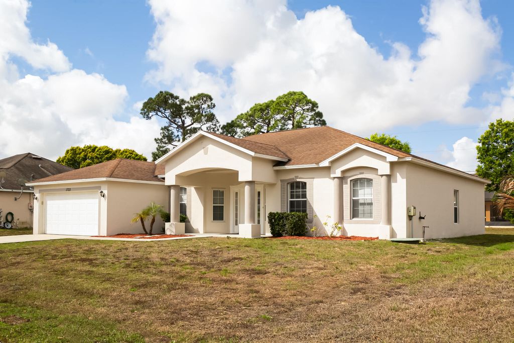 Photo of 1722 SW Anderson Street, Port Saint Lucie, FL 34953 (MLS # B26000787)
