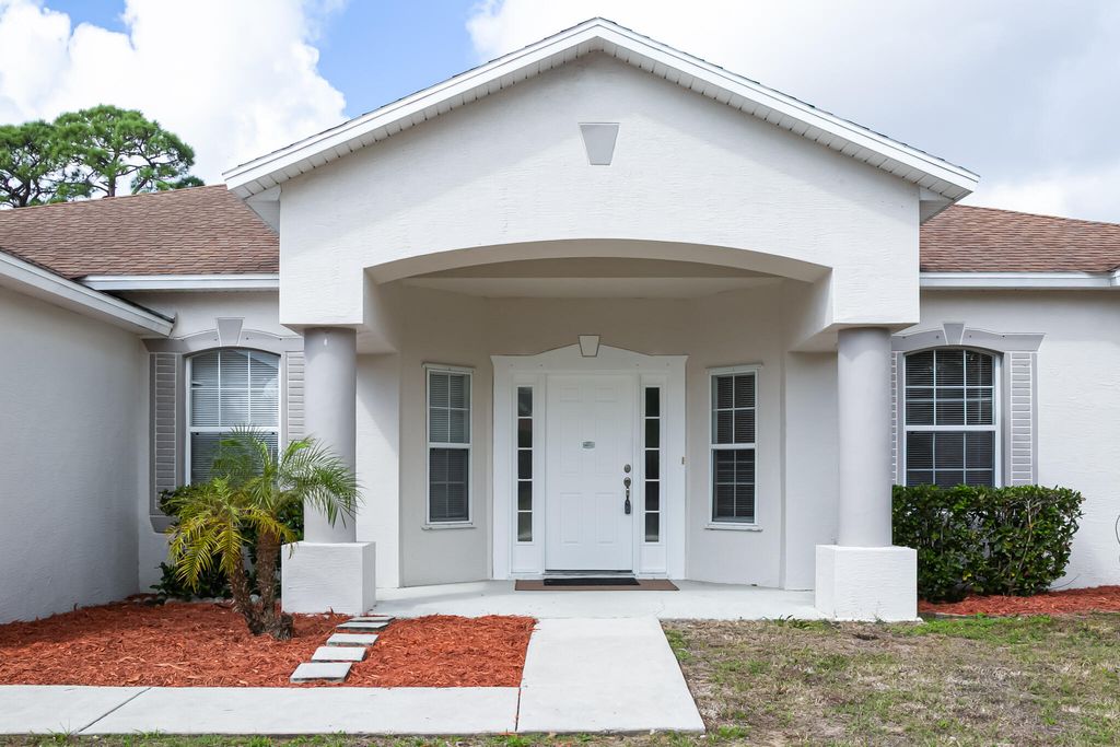 Photo of 1722 SW Anderson Street, Port Saint Lucie, FL 34953 (MLS # B26000787)