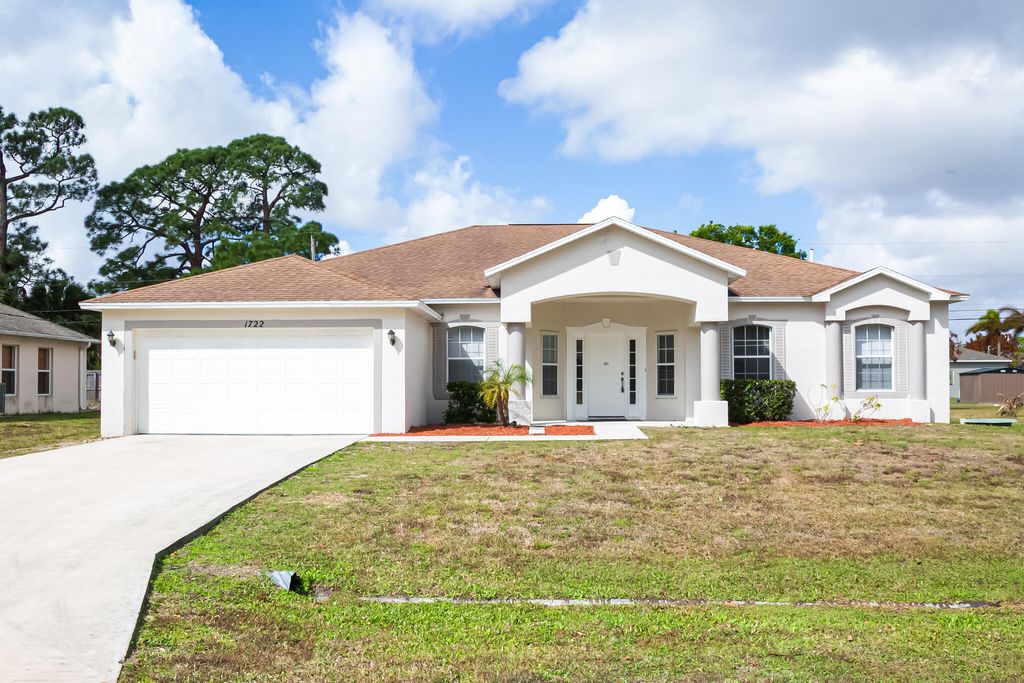 Photo of 1722 SW Anderson Street, Port Saint Lucie, FL 34953 (MLS # B26000787)