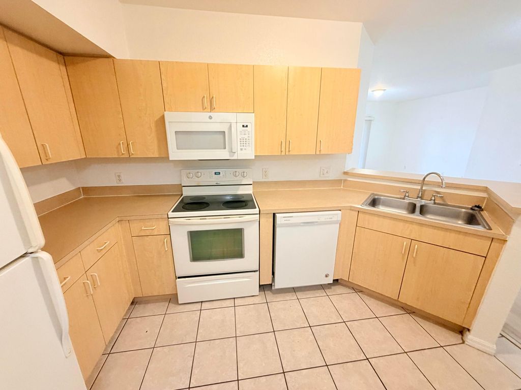Photo of 1302 Belmont Lane #1302, North Lauderdale, FL 33068 (MLS # B26021390)