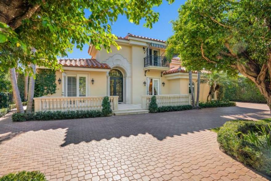 Mediterranean 4BR/6.5 BA home. 2 story living room with stone fireplace, formal DR, wood paneled library, chef's kitchen, family room and marble floors throughout. First floor master suite features fireplace, his and hers baths and closets. 3 additional en-suite bedrooms and exercise room upstairs. Cabana bath, new marble decked gas heated 36' pool, fountain, generator and full impact glass thru entire home. Only 3 houses from the beach with deeded beach access are a few of the features of this home.