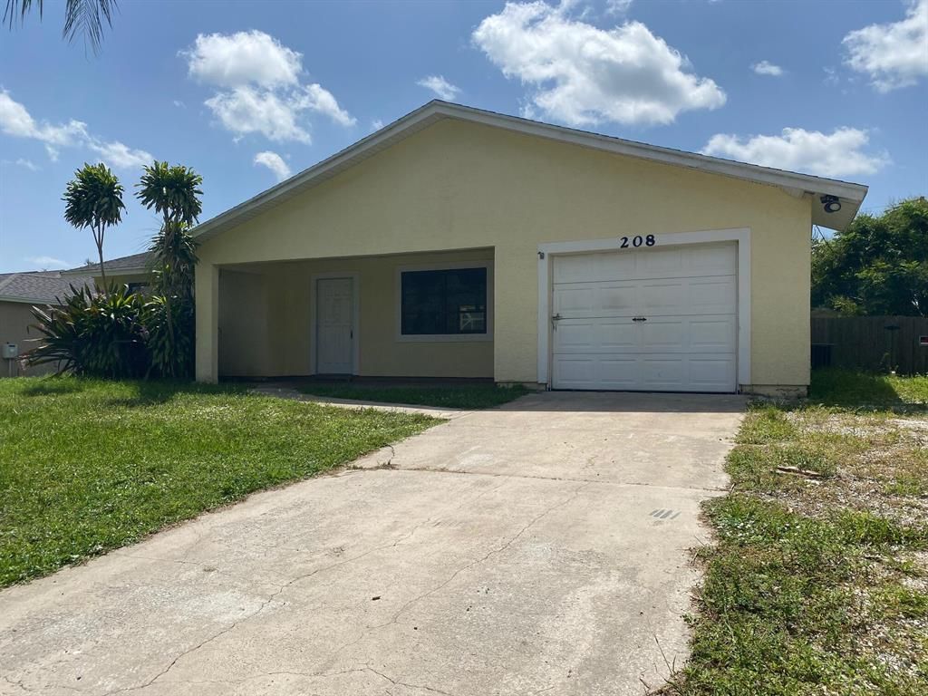 Photo of 208 SE Eyerly Avenue Ave, Port St Lucie, FL 34983 (MLS # R10744537)