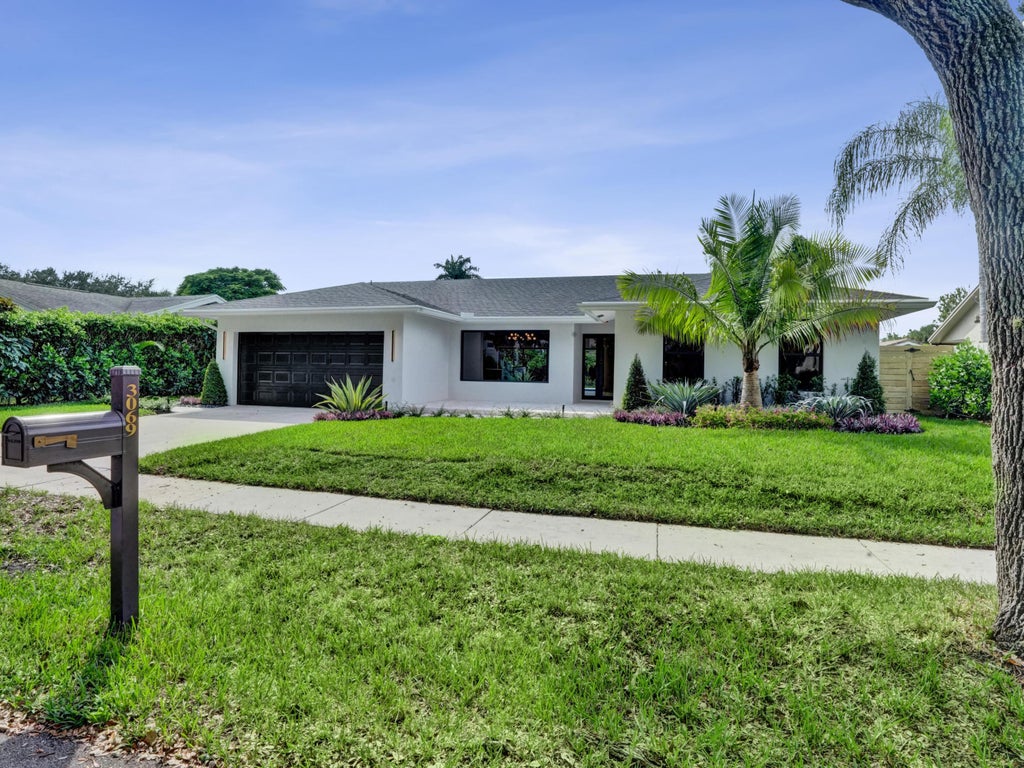 Photo of 3069 NW 27TH Avenue, Boca Raton, FL 33434 (MLS # B26085904)