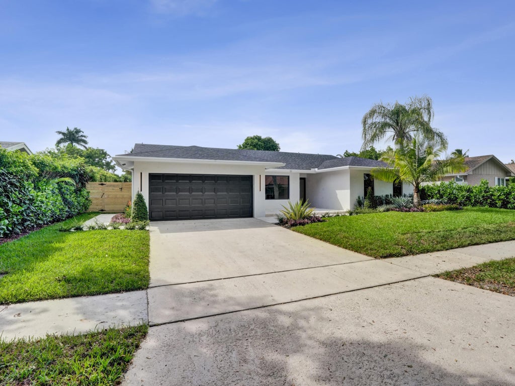 Photo of 3069 NW 27TH Avenue, Boca Raton, FL 33434 (MLS # B26085904)