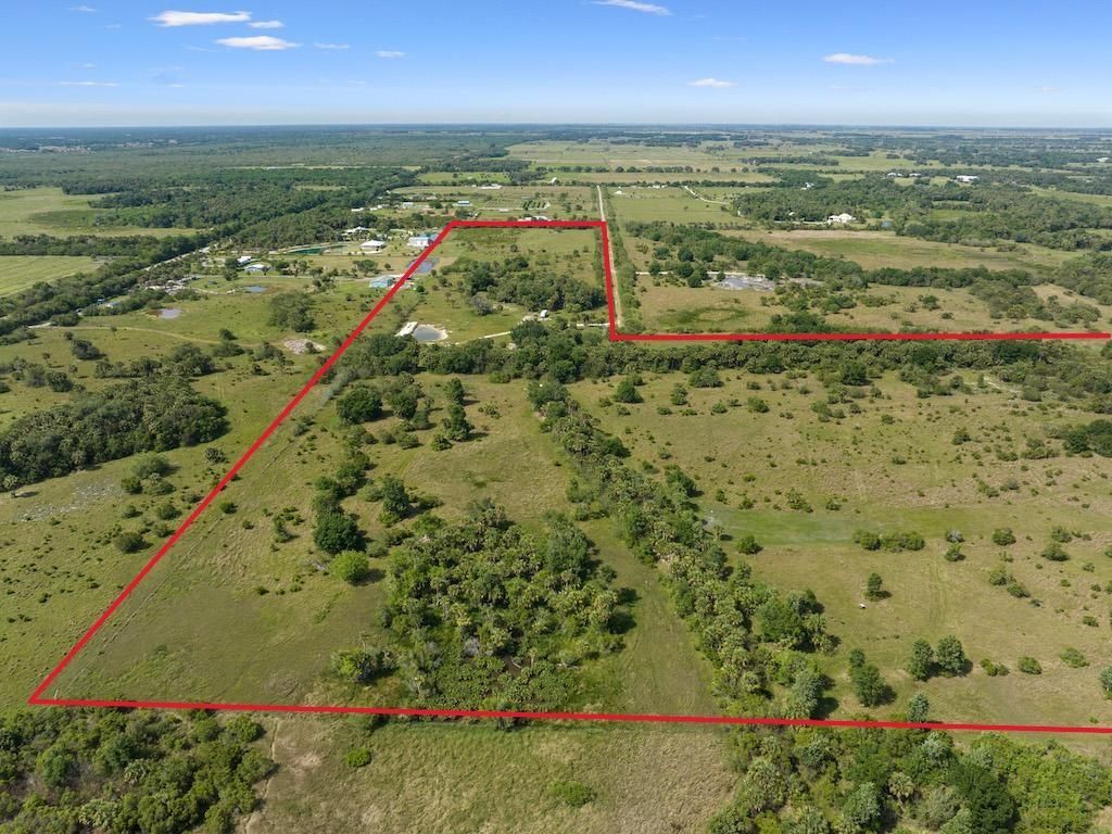 Photo of 7860 Germany Canal Road, Port Saint Lucie, FL 34987 (MLS # F10480114)