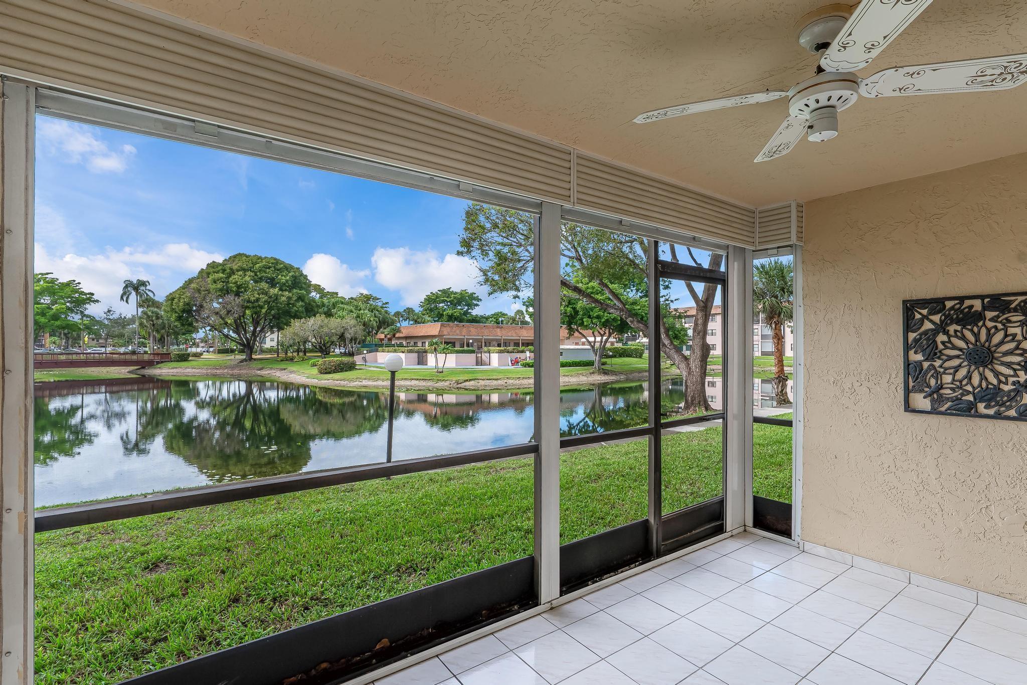 Prime Front & Center Lakefront View from this 1st Floor 2/2 in Impeccable 55+ Community! Park at Your Door then Step Inside to Panoramic Views & a Spacious Floorplan. Foyer Entry Leads to Eat-In Kitchen w/Newer Appliances. Great Room Opens to Resort-Like Lakefront Patio (w/Storm Shutters) Perfect for Relaxing & Entertaining. Easy Backdoor Access for Scenic Walks Along Waterside Path. Owner Suite w/Walk-In Closet, Dressing Area & Ensuite Shower. Guest Bdrm w/Walk-in Closet; Guest Bath w/Tub. Impact Windows. Washer & Dryer Inside Large Utility Rm w/Plenty of Storage Space. Tile T/O. A/C & W/H Just Over 5+ Yrs. Conventional w/20% Down. NO FHA/VA. 2022 Roof. 40Y Insp. Done. Full Reserves. NO Spec. Assessments! Fiberoptic Cable, Internet, HBO MAX, DVR Recording. Clubhouse, Pool, Tennis, Gym