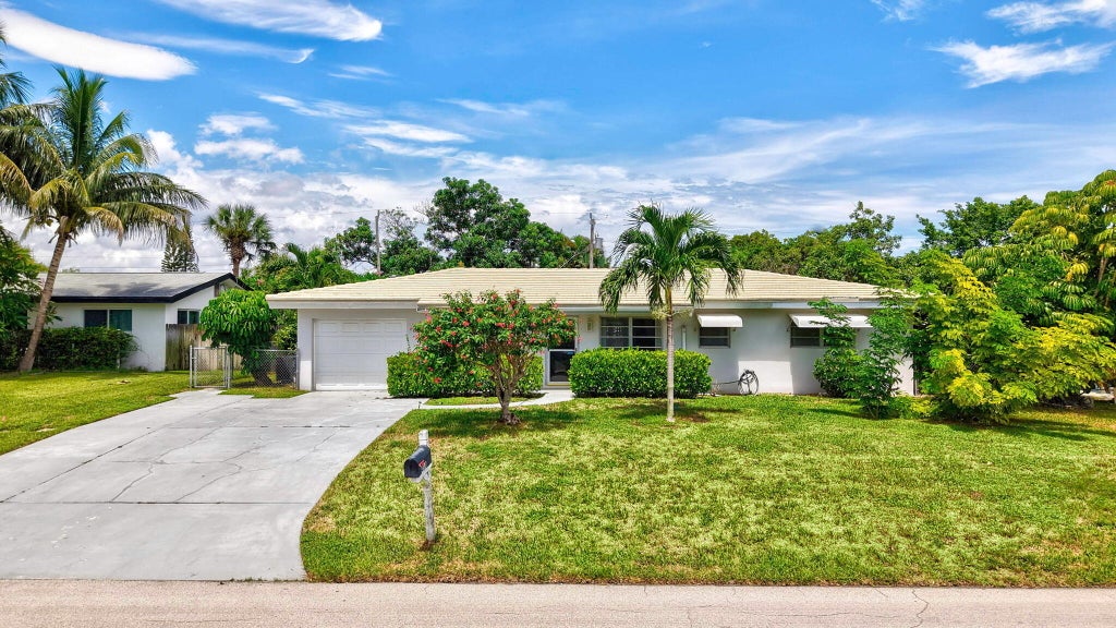 Photo of 469 NE 35TH Street, Boca Raton, FL 33431 (MLS # B26074756)