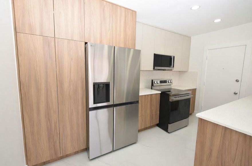 Welcome home, to this fully and tastefully remodeled paradise! This centrally located 2 bed 1 1/2 bath unit features a brand new kitchen with an oversized island and new state of the art cabinetry, brand new stainless steel appliances and recessed lighting. This second floor  unit features marble like porcelain tile flooring throughout, new bathroom vanities lighting and new shower doors. This unit has been meticulously renovated with hurricane impact doors in the master bedroom and too many upgrades to list and will check off all boxes! Adult 55+community. Water and internet included!