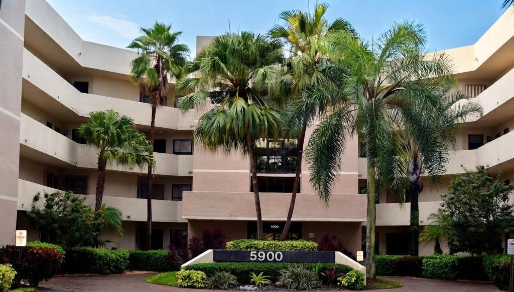 Photo of 5900 Camino Del Sol #302, Boca Raton, FL 33433 (MLS # B26085627)