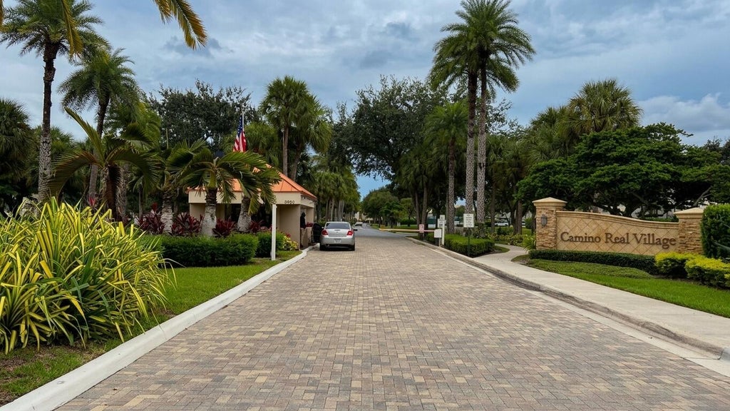 Photo of 5900 Camino Del Sol #302, Boca Raton, FL 33433 (MLS # B26085627)