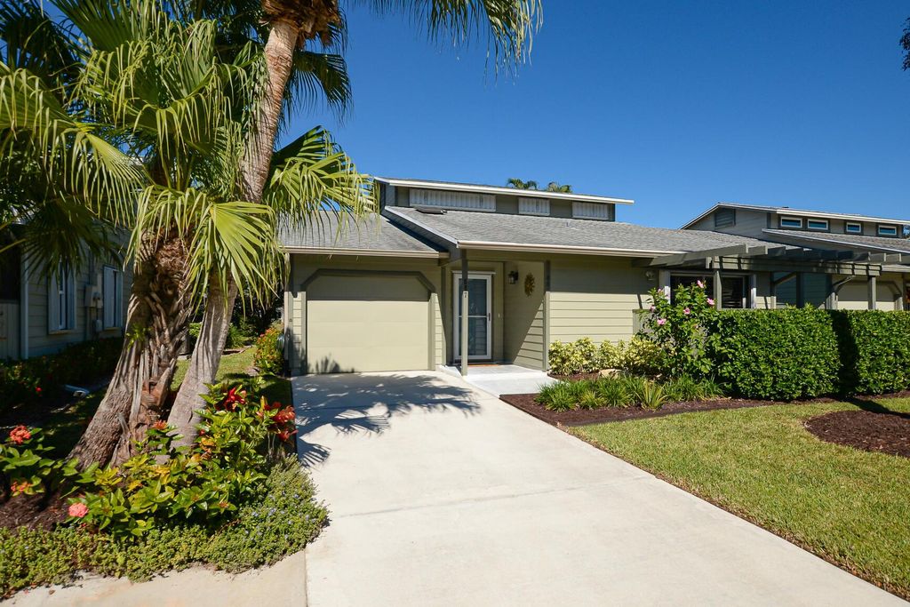 Photo of 887 NE Dahoon Terrace, Jensen Beach, FL 34957 (MLS # R11140949)