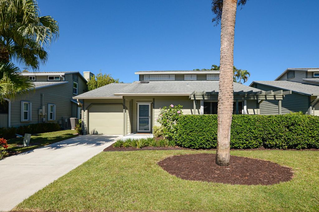 Photo of 887 NE Dahoon Terrace, Jensen Beach, FL 34957 (MLS # R11140949)