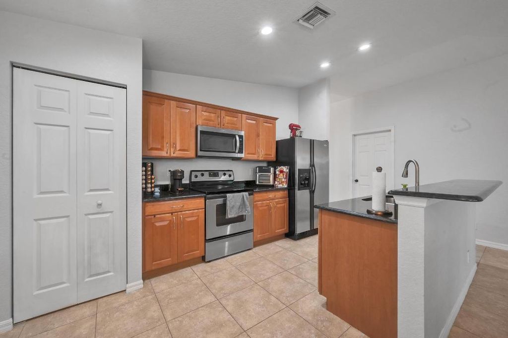 Photo of 4856 SE Duval Drive, Stuart, FL 34997 (MLS # R10941424)