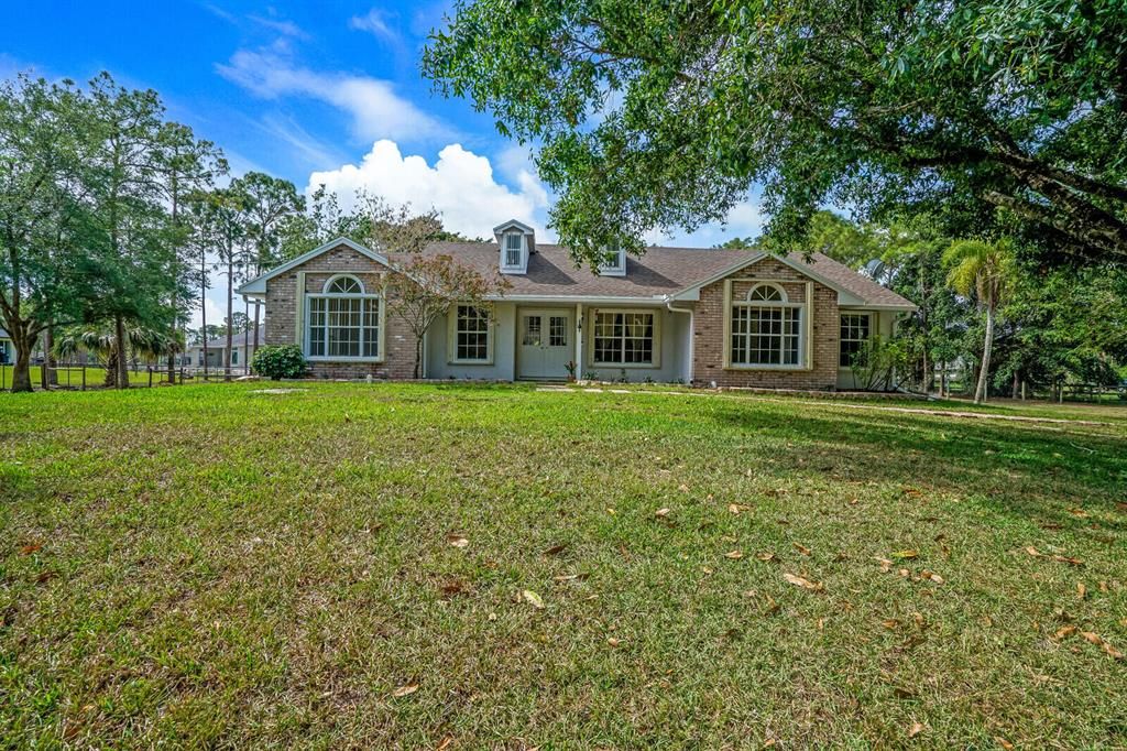 Photo of 15324 64th Place N, The Acreage, FL 33470 (MLS # R10881084)