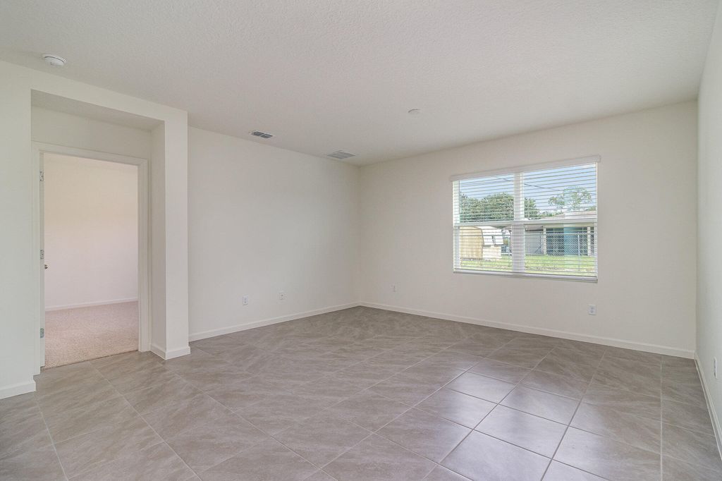 Photo of 1925 SE Sandia Drive, Port Saint Lucie, FL 34983 (MLS # R10974010)