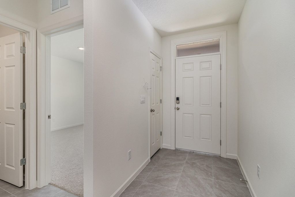 Photo of 1925 SE Sandia Drive, Port Saint Lucie, FL 34983 (MLS # R10974010)