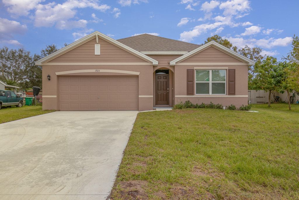 Photo of 1925 SE Sandia Drive, Port Saint Lucie, FL 34983 (MLS # R10974010)