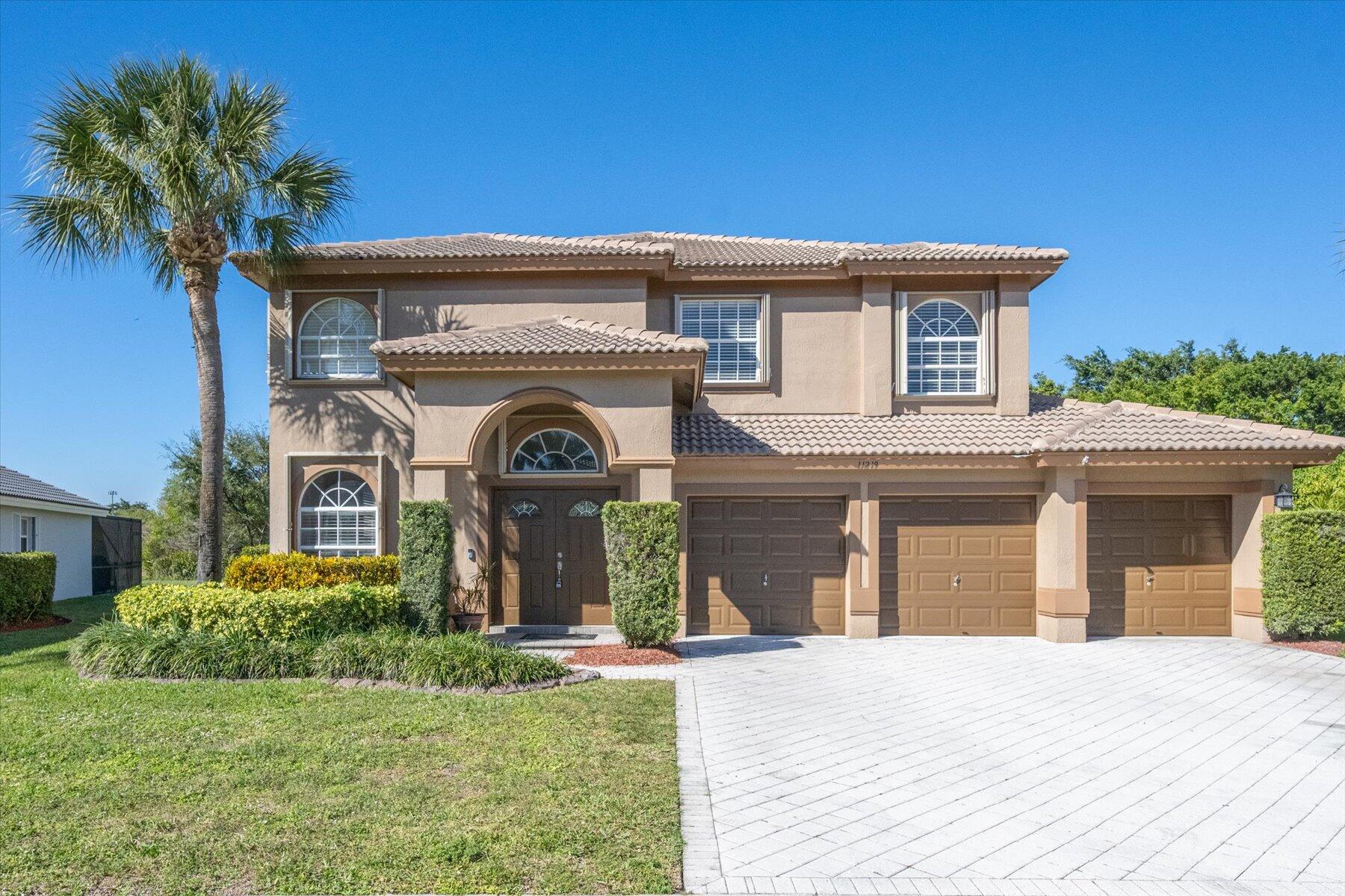 Beautiful pool home on oversized preserve/lakefront lot fully fenced in gated Grand Isles. Wide open floor plan with formal living and dining room, gourmet kitchen with SS appliances, granite, center island and breakfast area. Downstairs has guest bedroom and full bath and 4 bedrooms upstairs. All tile and wood laminate flooring thru out, screened covered patio, I ground pool with new salt system pool pump, newer water heater, inside laundry room with newer washer/dryer and wash tub. Spacious master bedroom, glass enclosed shower, granite countertops, and balcony. Great community with clubhouse and amenities. Walk to ''A'' rated schools.