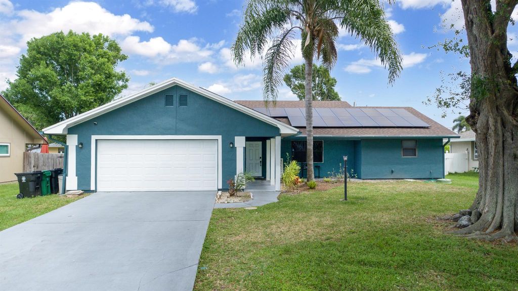 Photo of 1149 SE Clifton Lane, Port Saint Lucie, FL 34983 (MLS # R10971017)