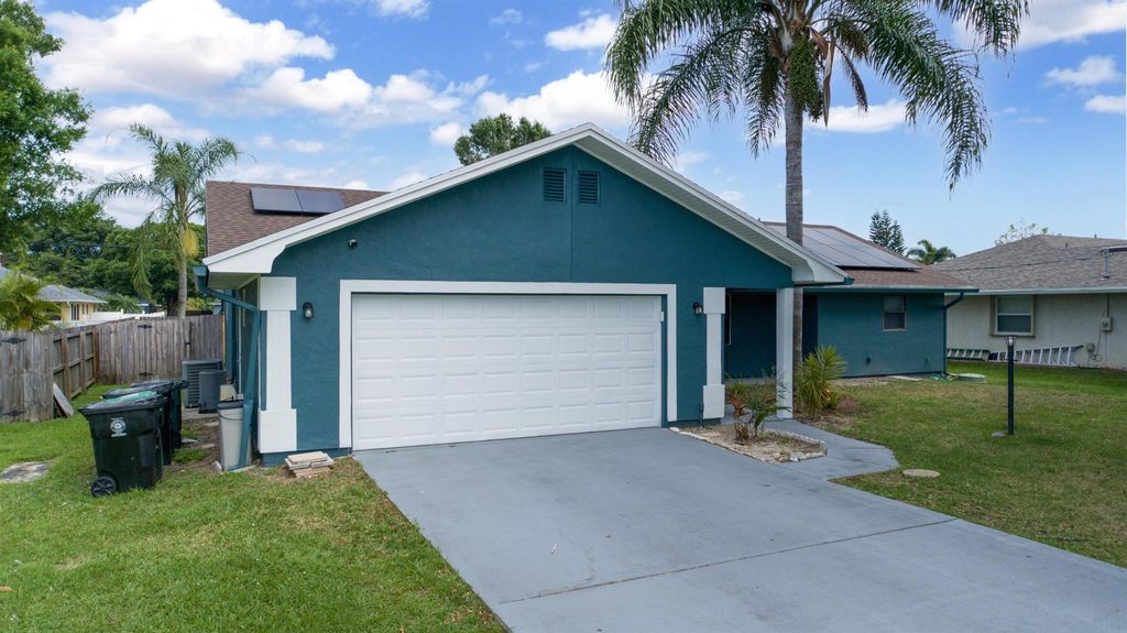 Photo of 1149 SE Clifton Lane, Port Saint Lucie, FL 34983 (MLS # R10971017)