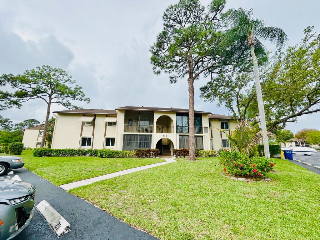 Photo of 140 Lake Pine Circle #A-1, Greenacres, FL 33463 (MLS # B26014089)