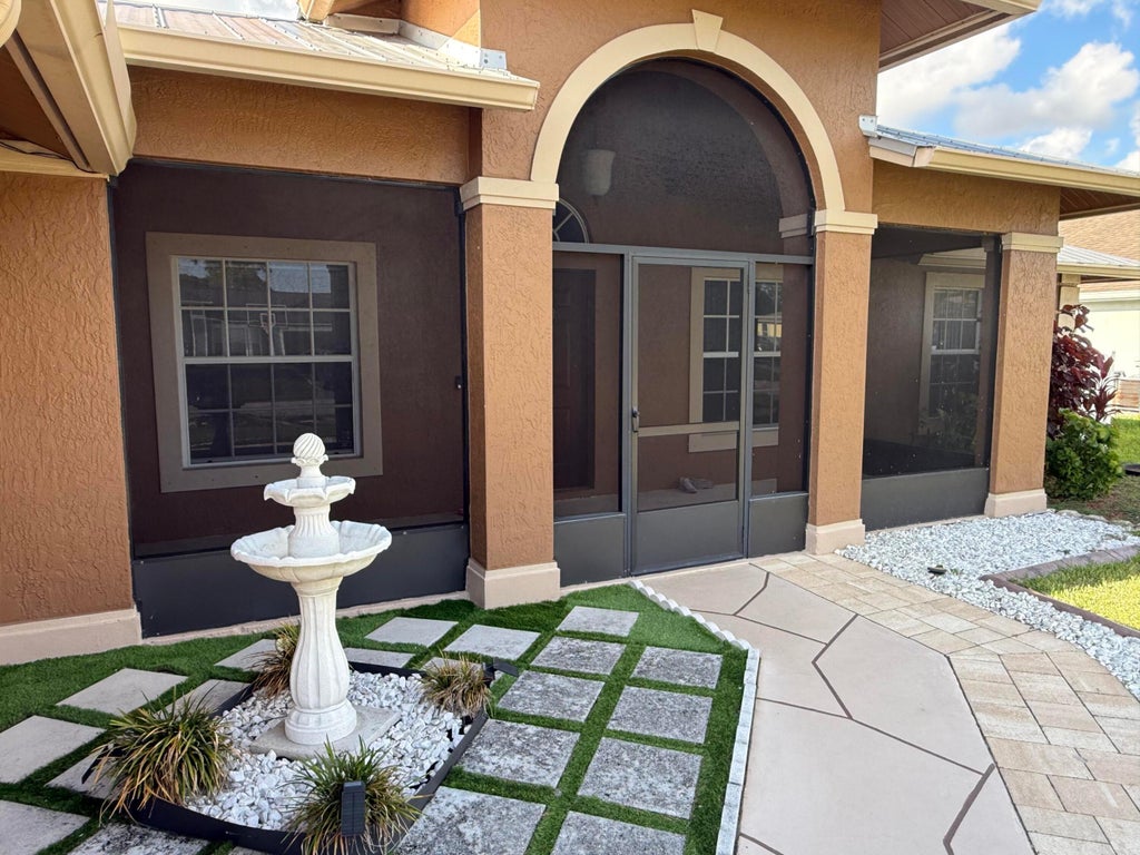 Photo of 1481 SW Jacksonville Avenue, Port Saint Lucie, FL 34953 (MLS # B26035541)