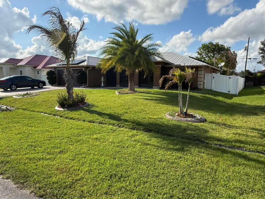 Photo of 1481 SW Jacksonville Avenue, Port Saint Lucie, FL 34953 (MLS # B26035541)