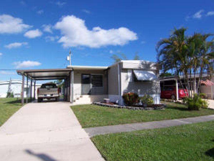 Own your lot.  Devenez proprietaire de votre terrain.Move right in. Turnkey.  Furnished. Immaculate.  Split bedroom plan. See photos.  Make your move fast. Demand is high, inventory low. Community well managed. Low maintenance fee includes lawn cut, water, sewer and common elements care.