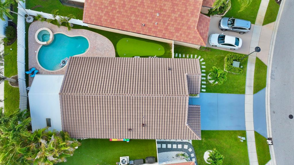 Photo of 6883 Desert Inn Terrace, Lake Worth, FL 33463 (MLS # B26051367)