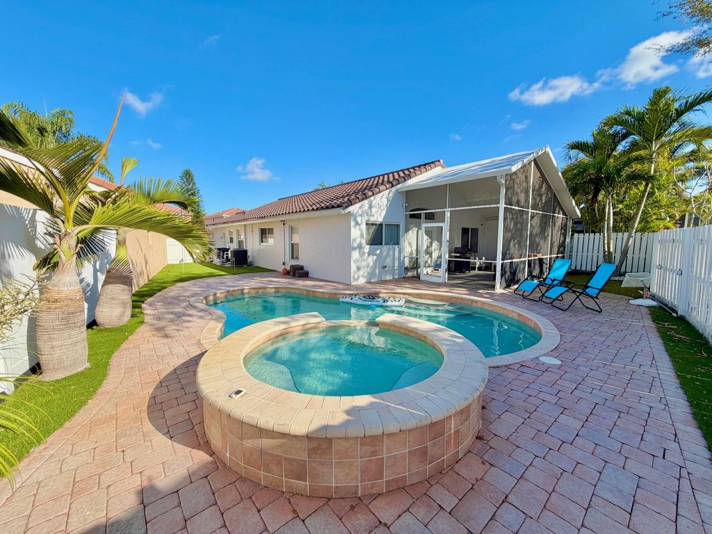 Photo of 6883 Desert Inn Terrace, Lake Worth, FL 33463 (MLS # B26051367)