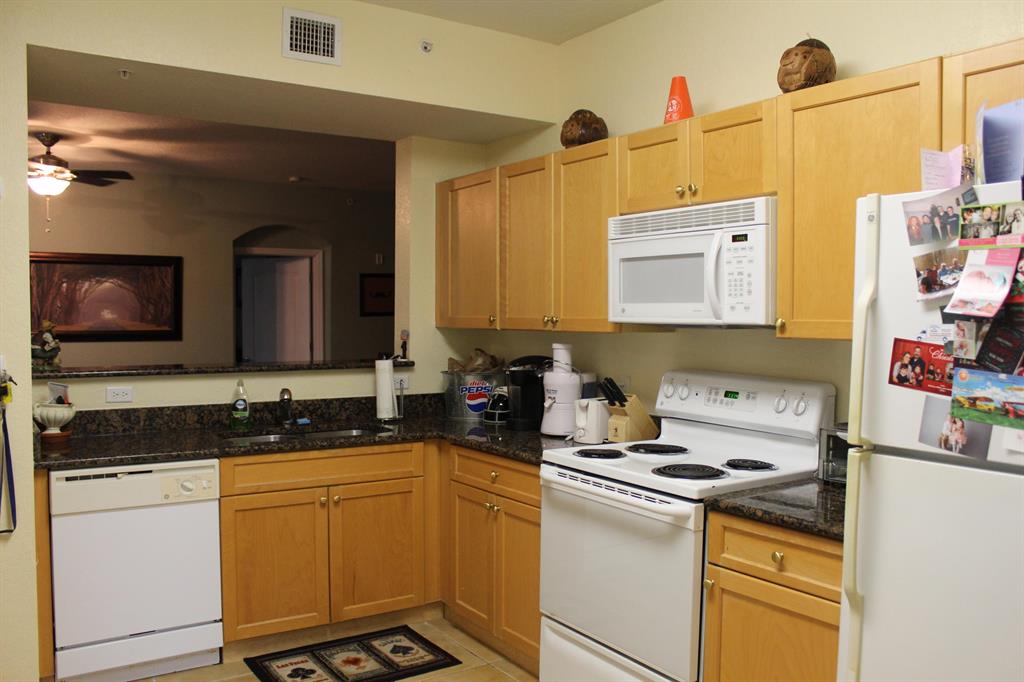 Ideally located 1 bedroom, 1 bath condo in Legacy Place! Walk to Publix Greenwise, Barnes N Noble, Total Wine, fine dining and much more! Palm Beach Gardens Medical Center is 1.5 miles away. With tile throughout (except Master), a spacious walk-in closet, and a washer and dryer in the unit, this is condo living at its best. Store your bikes, paddleboards, and more in the one car garage. Legacy Place also offers a beautiful community, complete with lakes, a pool, a spa, 2 gas grills/bbq areas, tennis courts, and a fitness center. One small dog allowed. Water is included in rent. Tenant must have minimum 700 credit score.